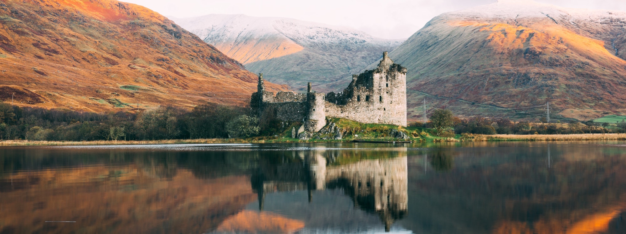 Castle surrounded by lake